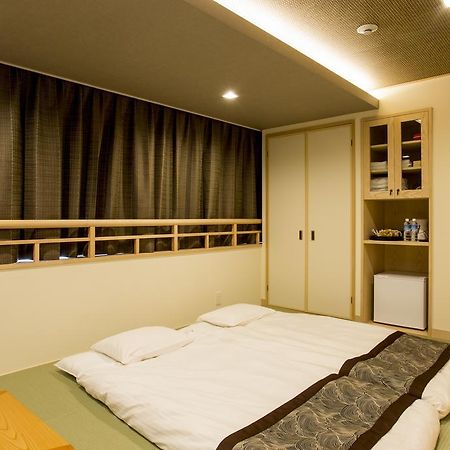 東心斎橋おおきにアパート Ookini Ryokan & Apartment Осака Екстер'єр фото