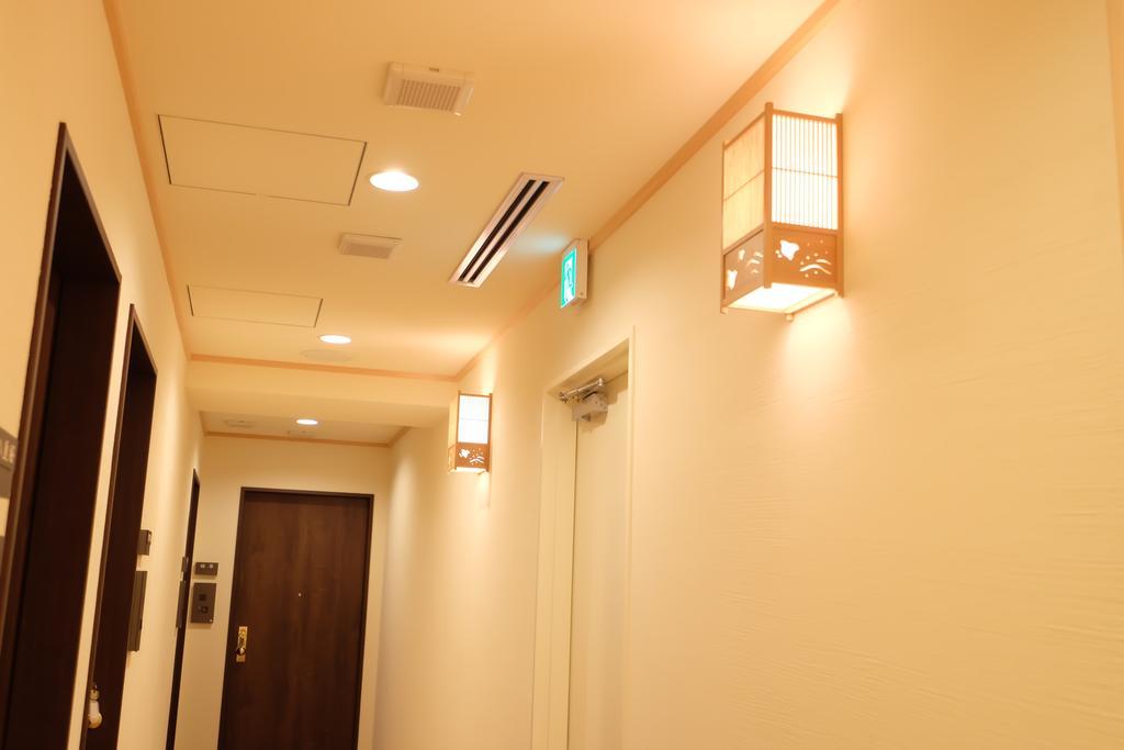 東心斎橋おおきにアパート Ookini Ryokan & Apartment Осака Екстер'єр фото