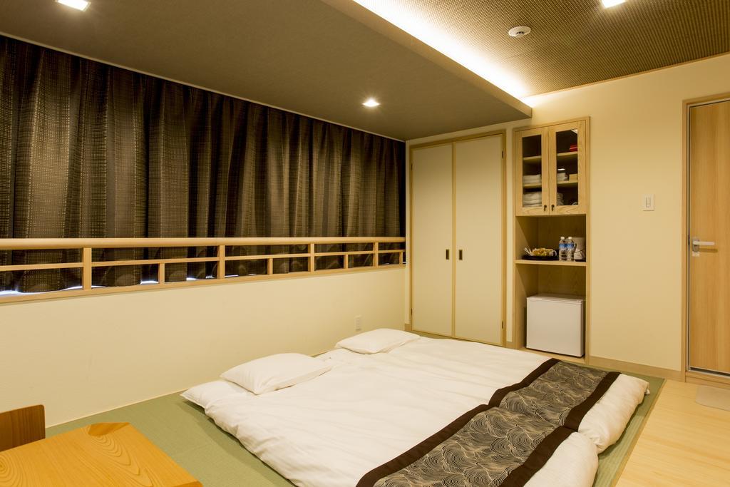 東心斎橋おおきにアパート Ookini Ryokan & Apartment Осака Екстер'єр фото