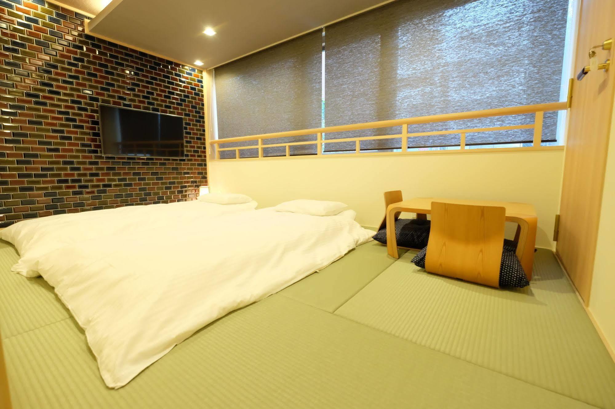 東心斎橋おおきにアパート Ookini Ryokan & Apartment Осака Екстер'єр фото