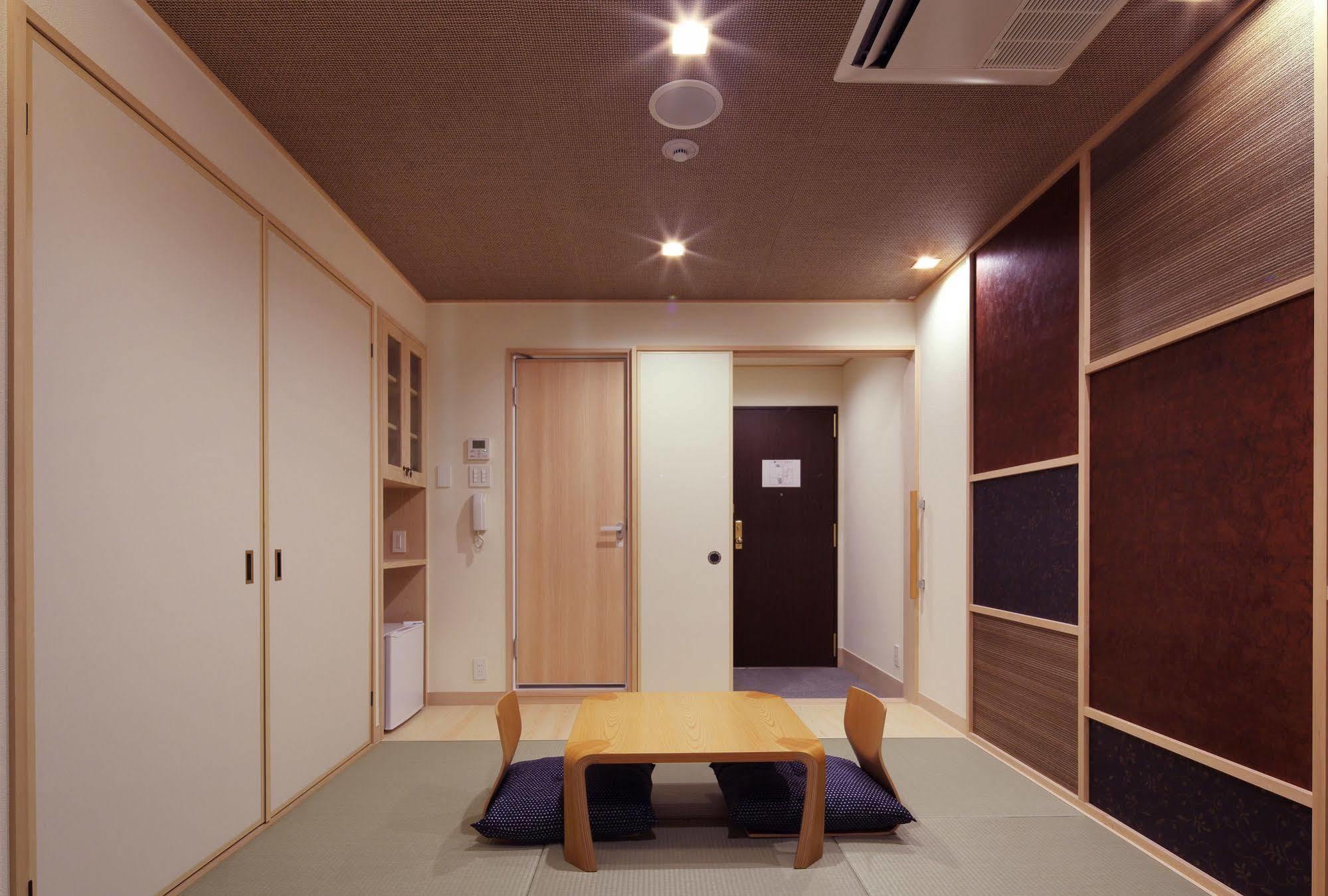 東心斎橋おおきにアパート Ookini Ryokan & Apartment Осака Екстер'єр фото