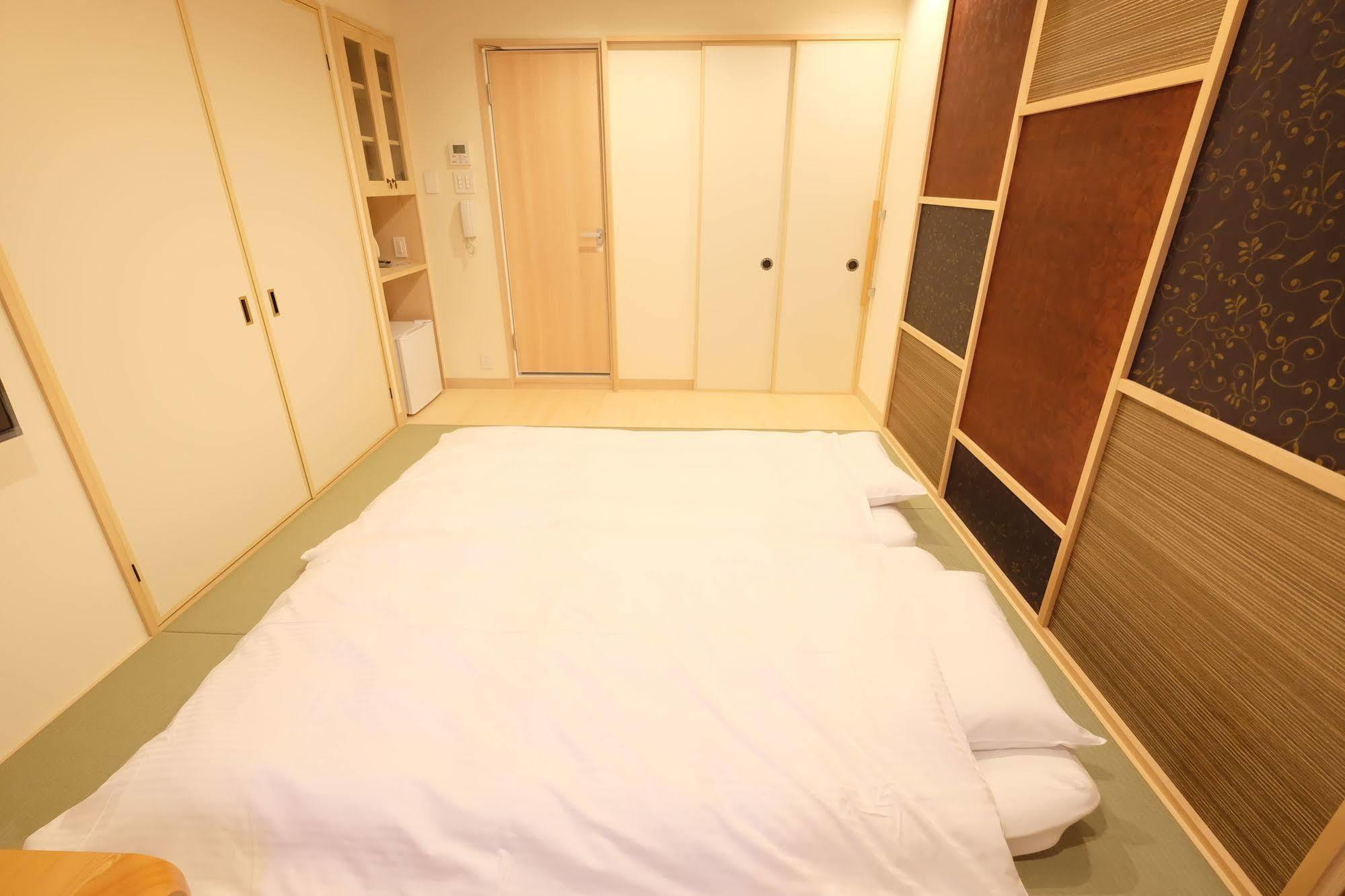 東心斎橋おおきにアパート Ookini Ryokan & Apartment Осака Екстер'єр фото
