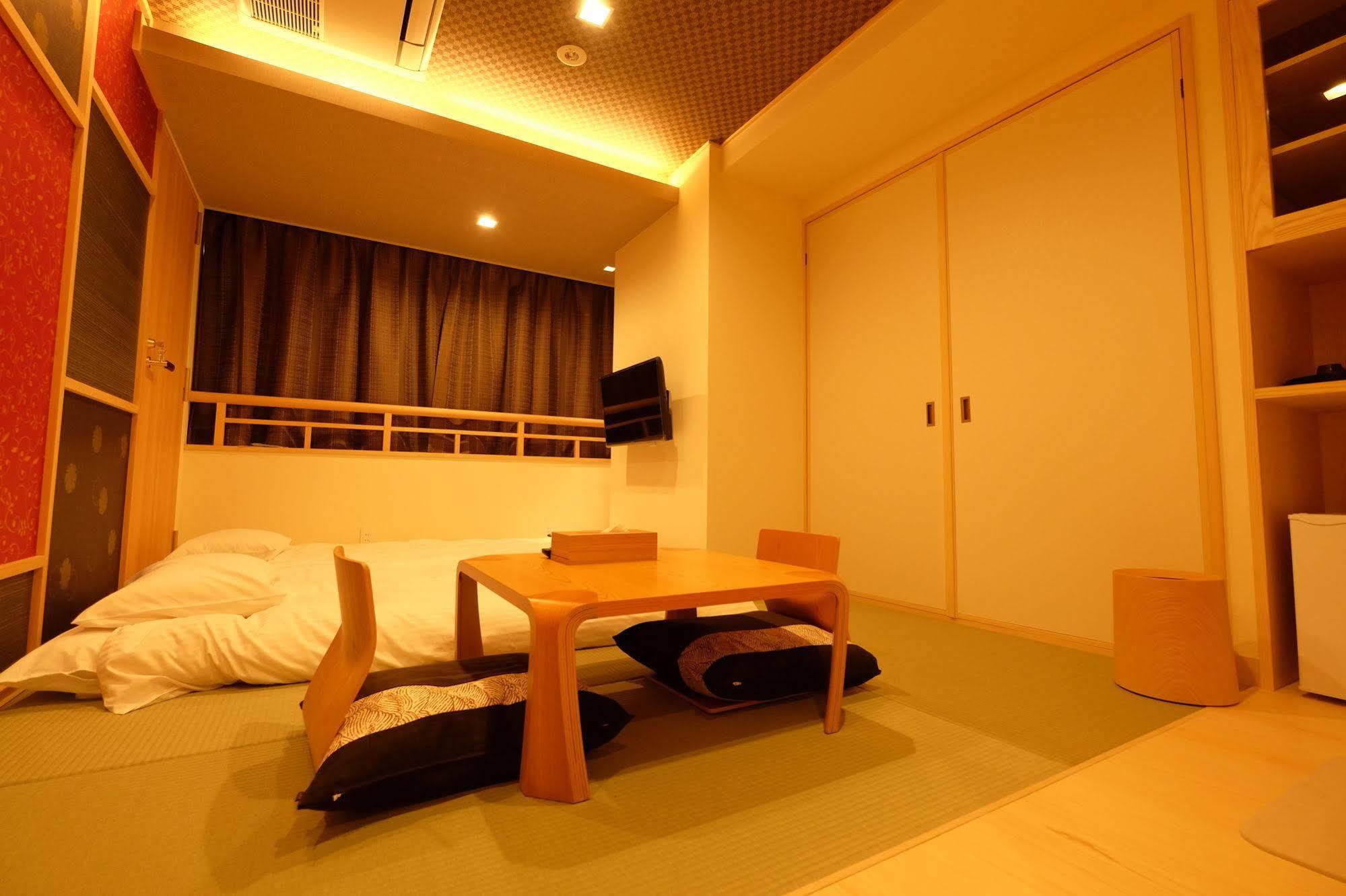 東心斎橋おおきにアパート Ookini Ryokan & Apartment Осака Екстер'єр фото